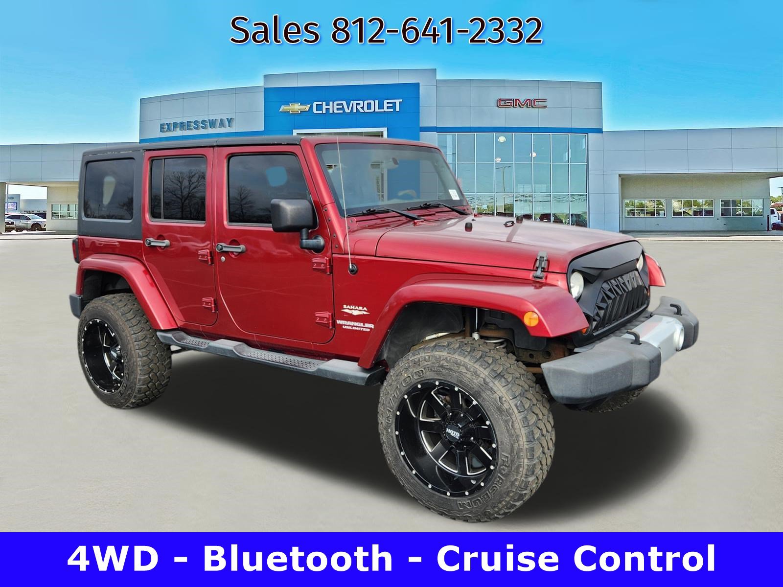 Used 2012 Jeep Wrangler Unlimited Sahara w/ Dual Top Group AWD/4WD image 1