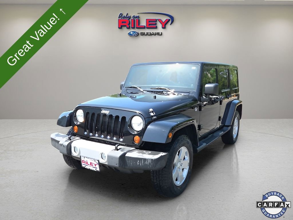 Used 2012 Jeep Wrangler Unlimited Sahara w/ Dual Top Group image 1