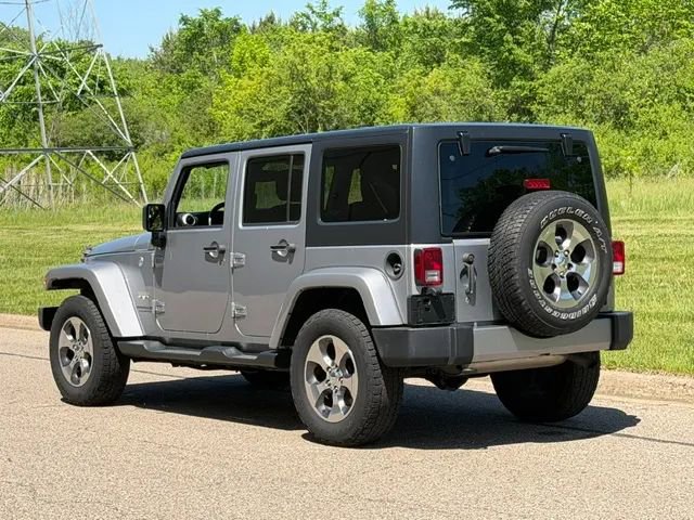 Used 2016 Jeep Wrangler Unlimited Sahara w/ Dual Top Group AWD/4WD image 9