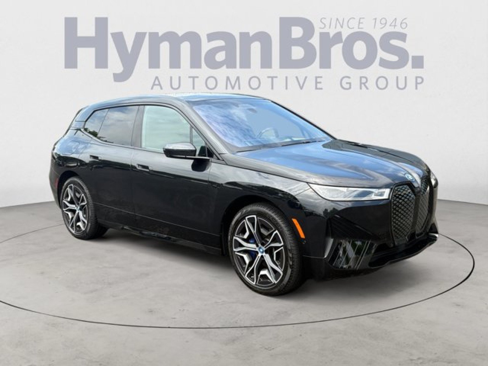 Used 2024 BMW iX xDrive50 w/ Sport Package AWD/4WD image 1