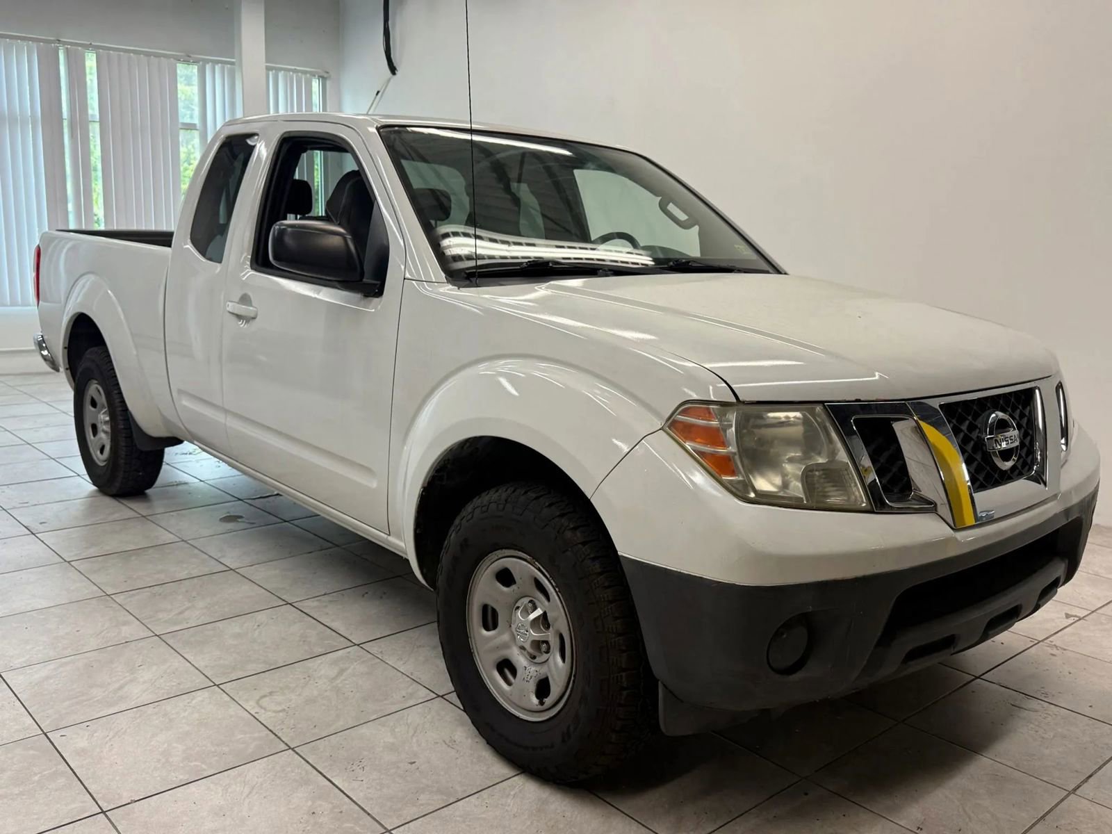 Used 2013 Nissan Frontier S image 1