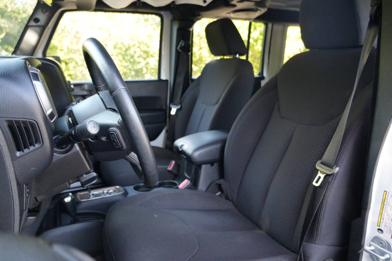 Used 2014 Jeep Wrangler Unlimited Sport w/ Mopar Black Appearance Group AWD/4WD image 14