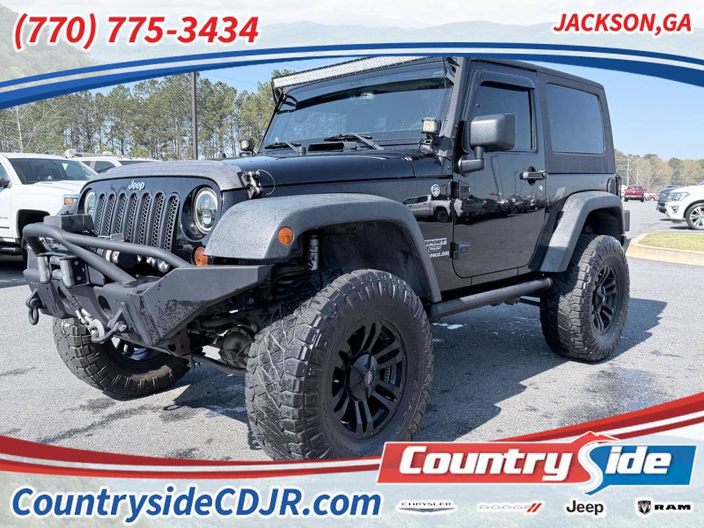 Used 2013 Jeep Wrangler Sport AWD/4WD video 1