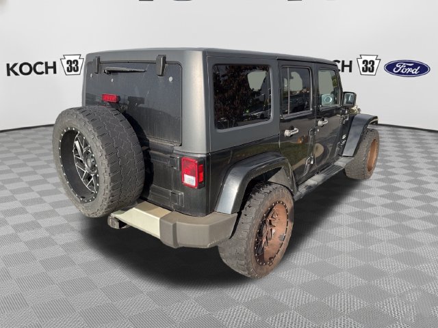 Used 2014 Jeep Wrangler Unlimited Sahara w/ Dual Top Group AWD/4WD image 7