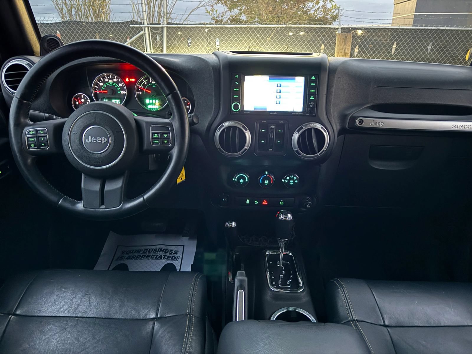 Used 2012 Jeep Wrangler Unlimited Sahara w/ Dual Top Group AWD/4WD image 9