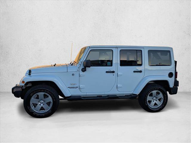 Used 2012 Jeep Wrangler Unlimited Sahara w/ Dual Top Group image 9