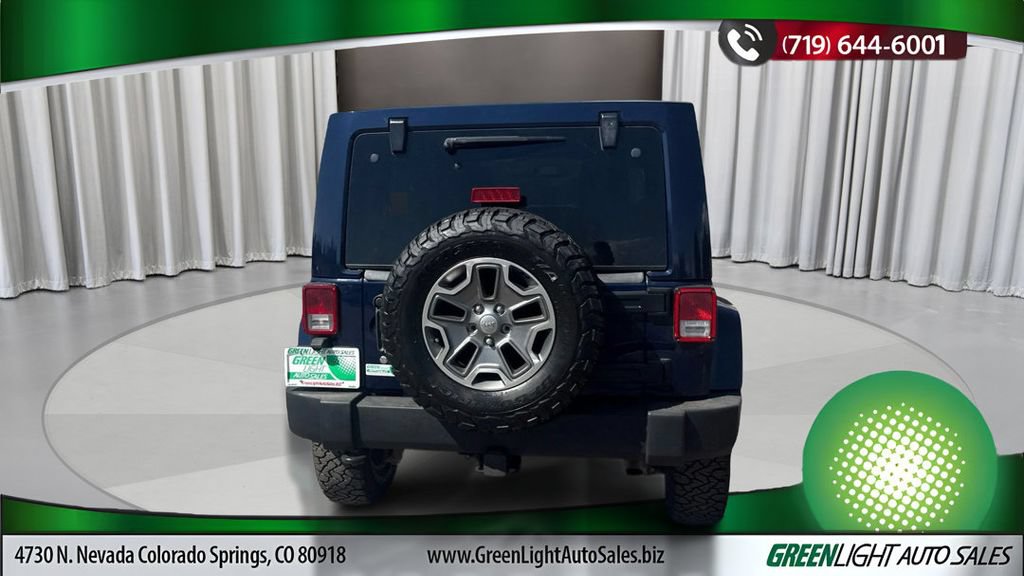 Used 2013 Jeep Wrangler Unlimited Rubicon w/ Dual Top Group AWD/4WD image 4