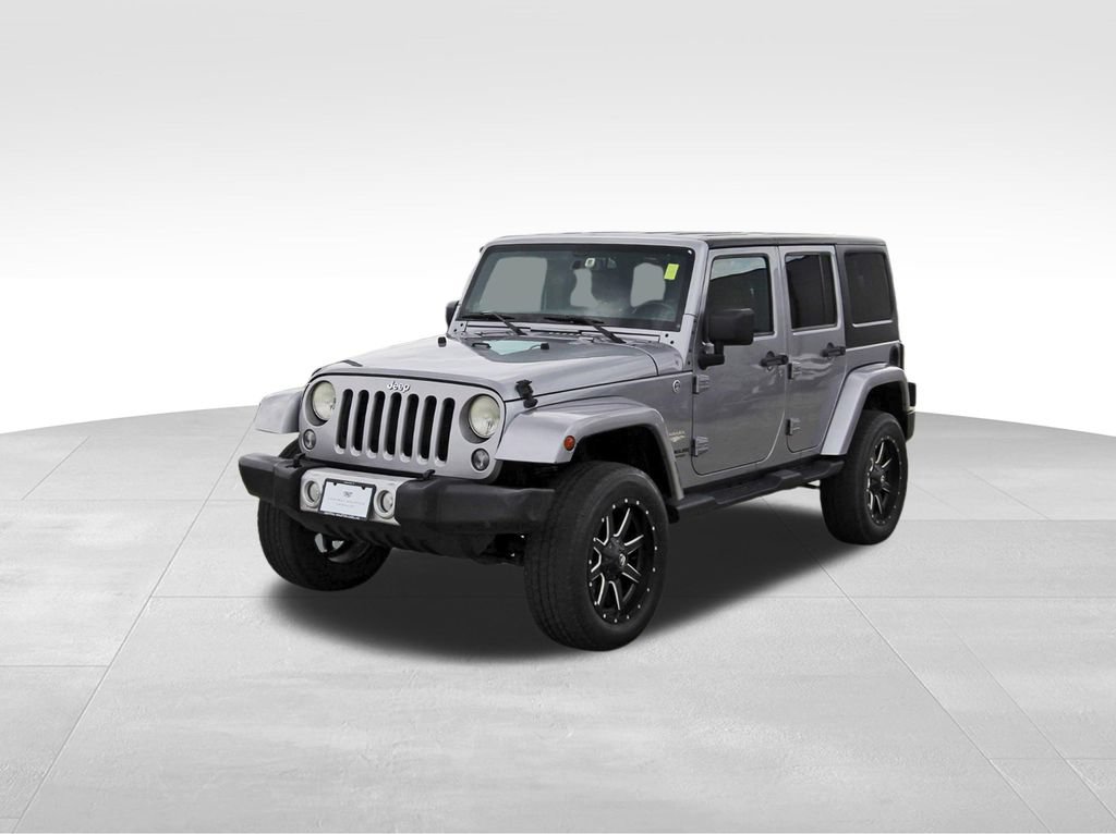 Used 2014 Jeep Wrangler Unlimited Sahara w/ Max Tow Package AWD/4WD video 2