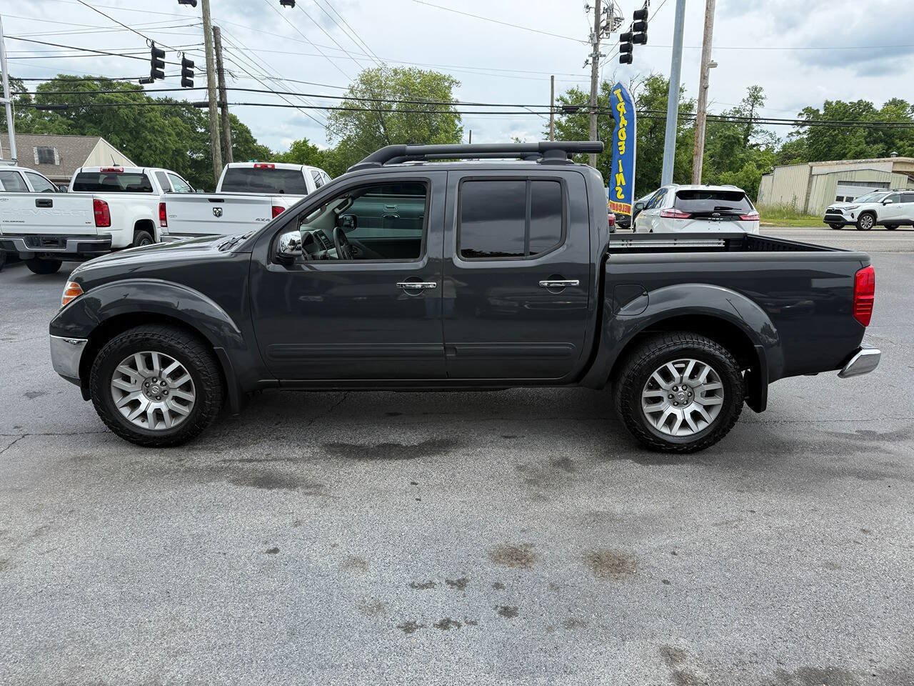Used 2012 Nissan Frontier SL AWD/4WD image 7