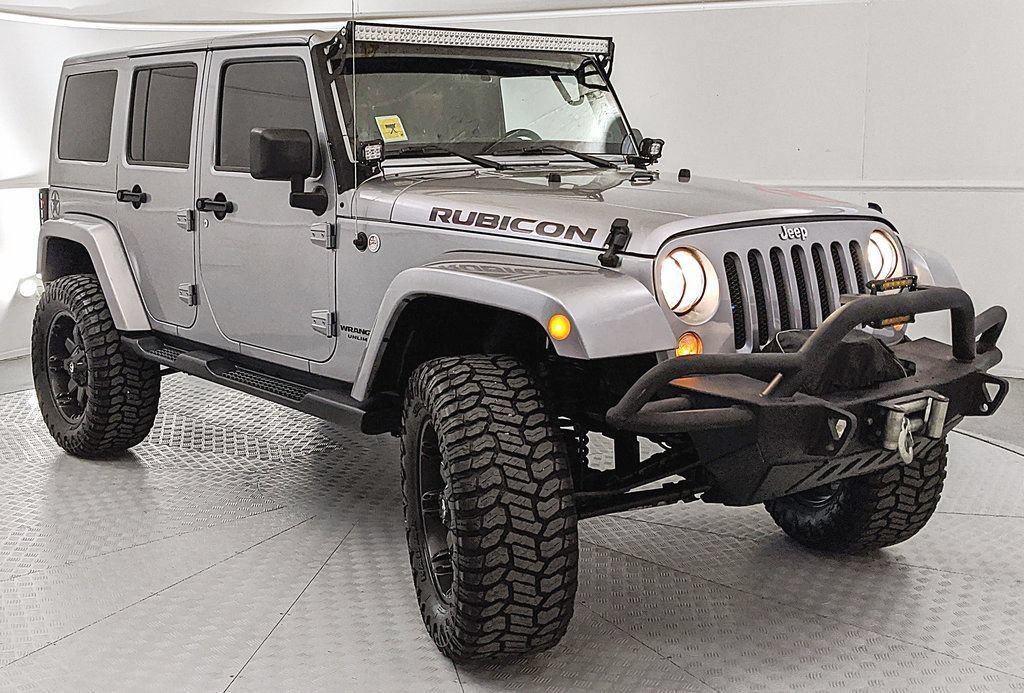 Used 2014 Jeep Wrangler Unlimited Rubicon w/ Dual Top Group