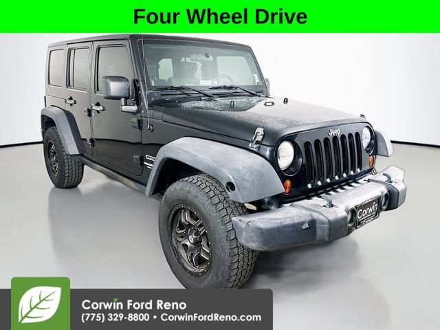 Used 2010 Jeep Wrangler Unlimited Sport AWD/4WD image 1