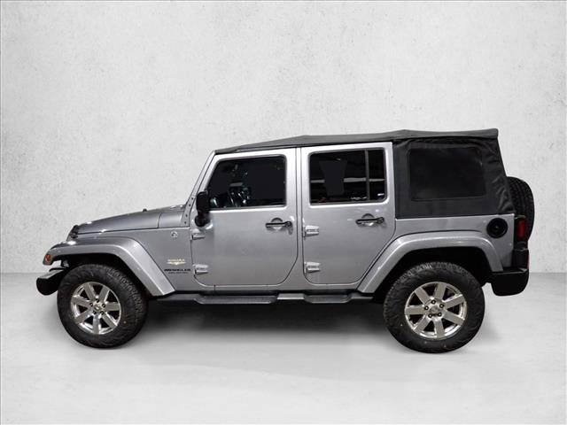 Used 2014 Jeep Wrangler Unlimited Sahara w/ Max Tow Package video 2