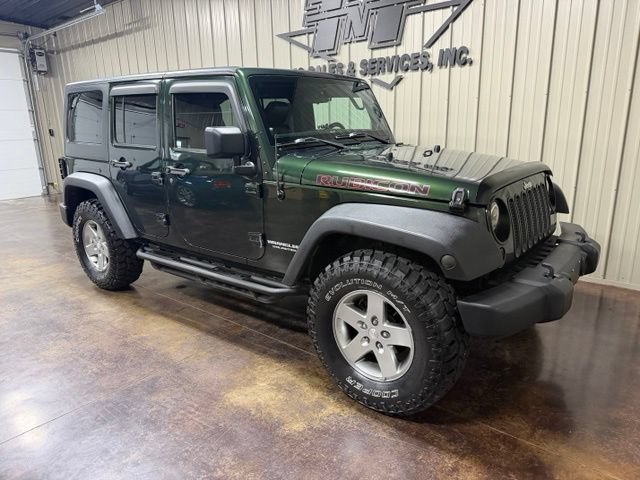 Used 2012 Jeep Wrangler Unlimited Rubicon w/ Dual Top Group AWD/4WD image 6