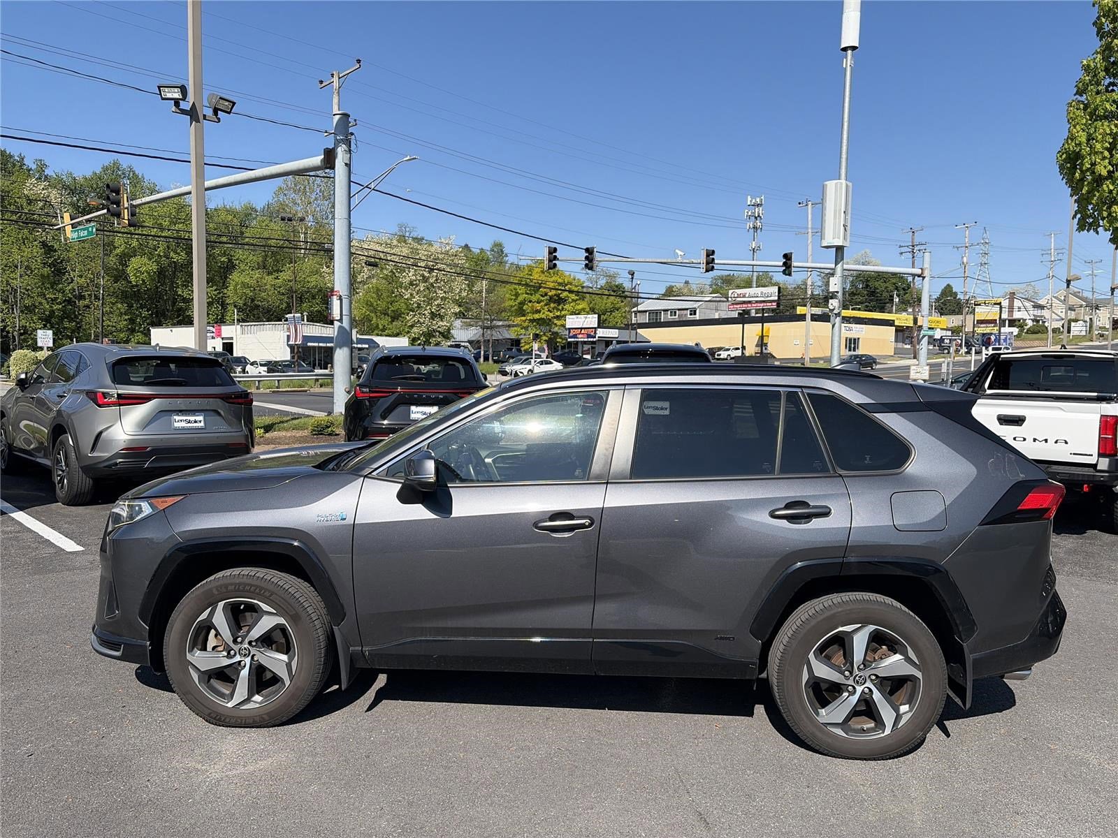 Used 2021 Toyota RAV4 SE w/ Weather & Moonroof Package AWD/4WD image 2