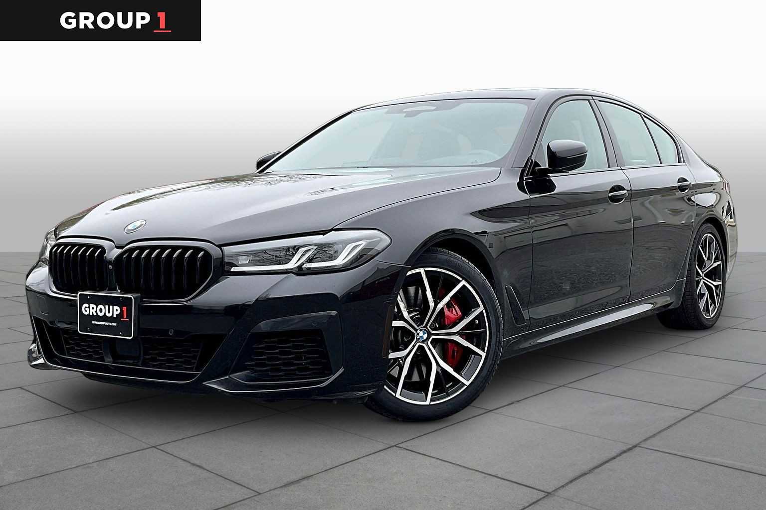 Used 2023 BMW M550i xDrive w/ Dynamic Handling Package AWD/4WD image 1