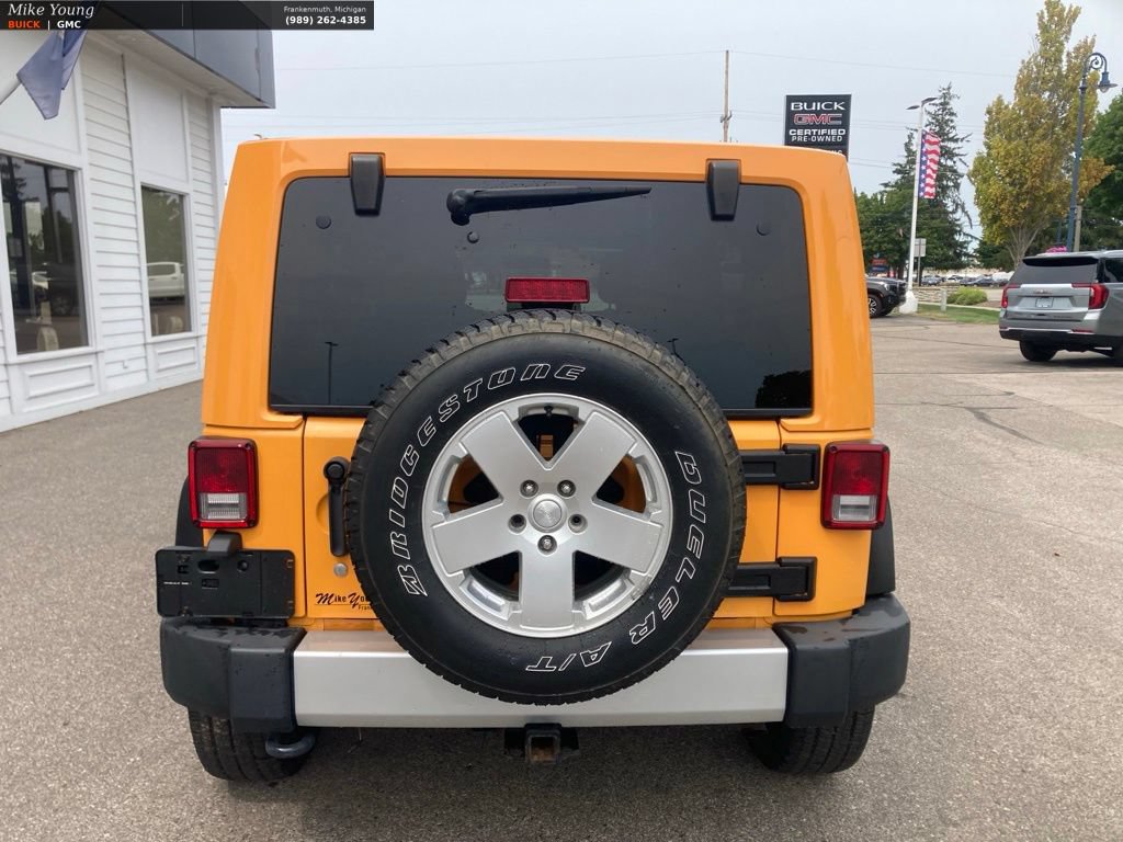Used 2012 Jeep Wrangler Unlimited Sahara w/ Dual Top Group AWD/4WD image 6
