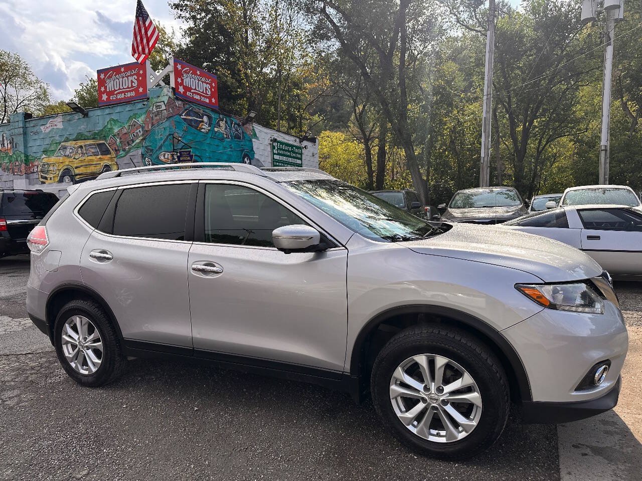 Used 2015 Nissan Rogue SV w/ SV Premium Package AWD/4WD image 1