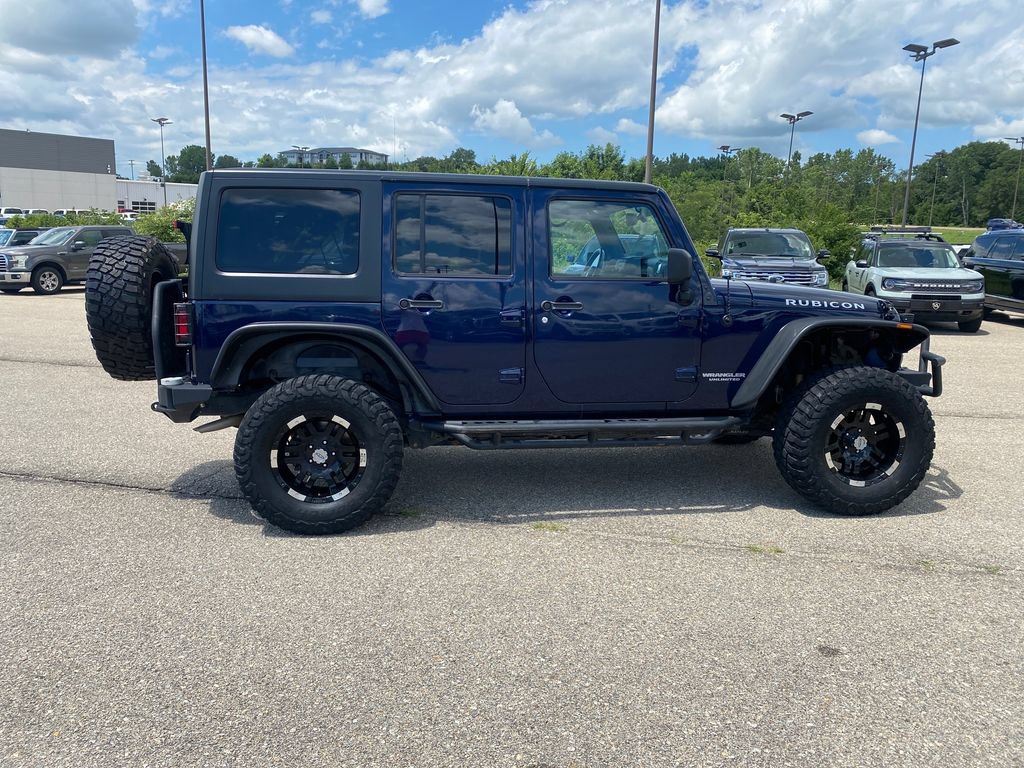 Used 2013 Jeep Wrangler Unlimited Rubicon w/ Dual Top Group AWD/4WD image 5