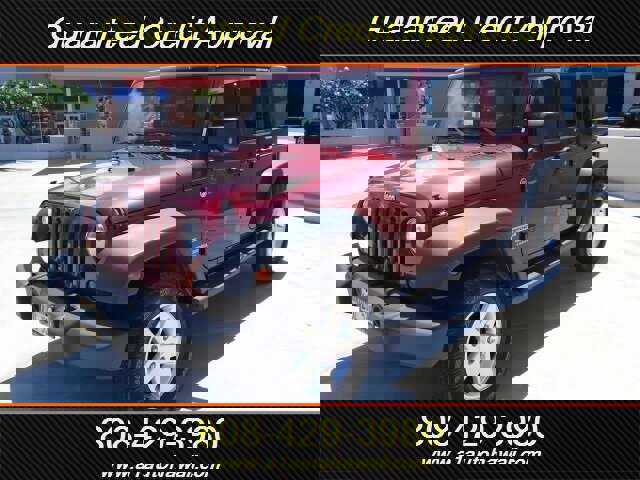 Used 2013 Jeep Wrangler Unlimited Sport image 1