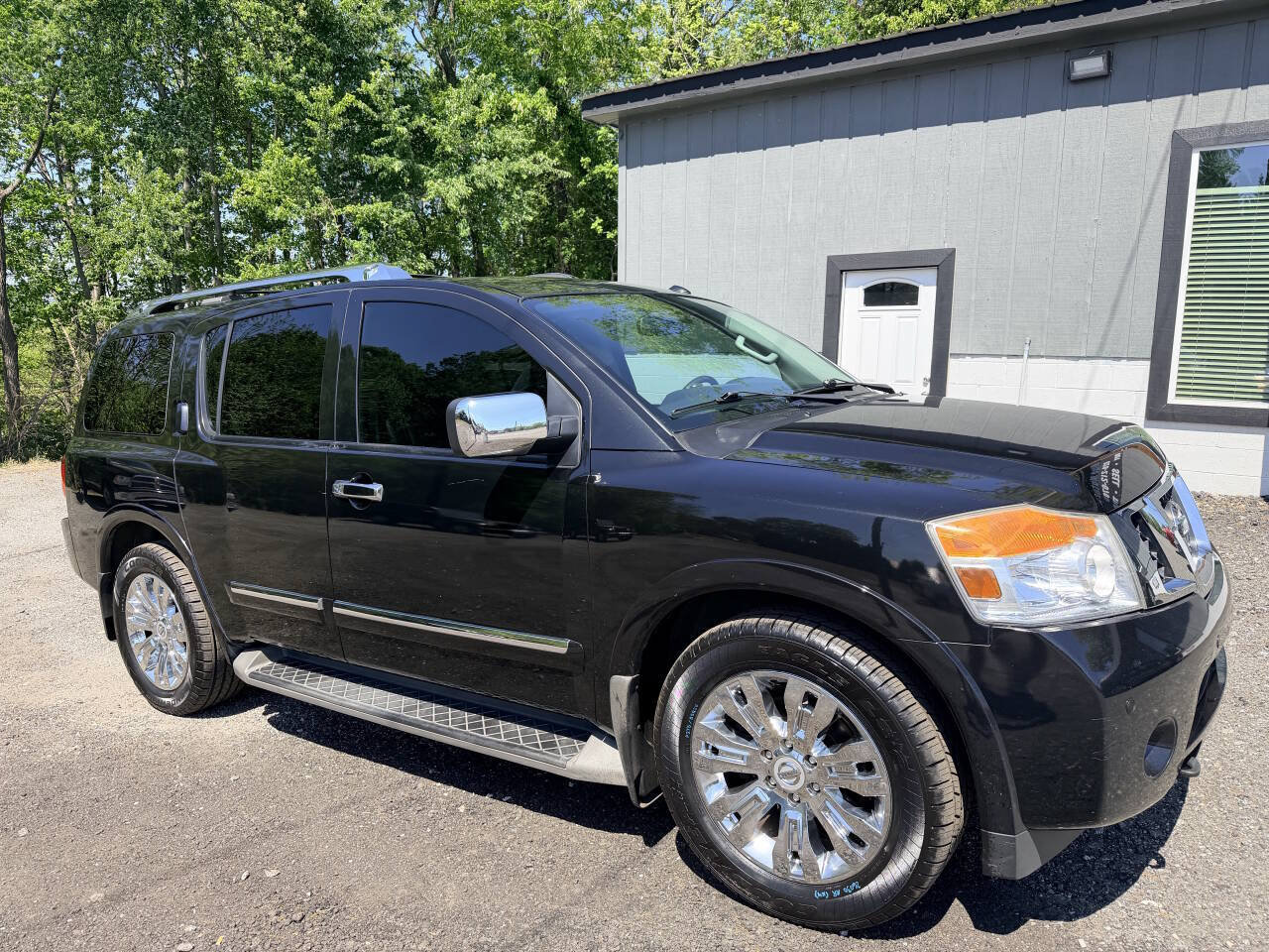 Used 2015 Nissan Armada Platinum w/ 2nd Row Captain Seat Package AWD/4WD image 1