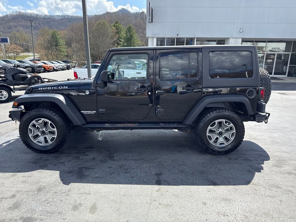 Used 2012 Jeep Wrangler Unlimited Rubicon w/ Dual Top Group image 9