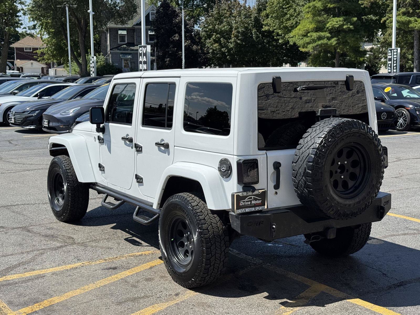 Used 2012 Jeep Wrangler Unlimited Sahara w/ Dual Top Group AWD/4WD image 7