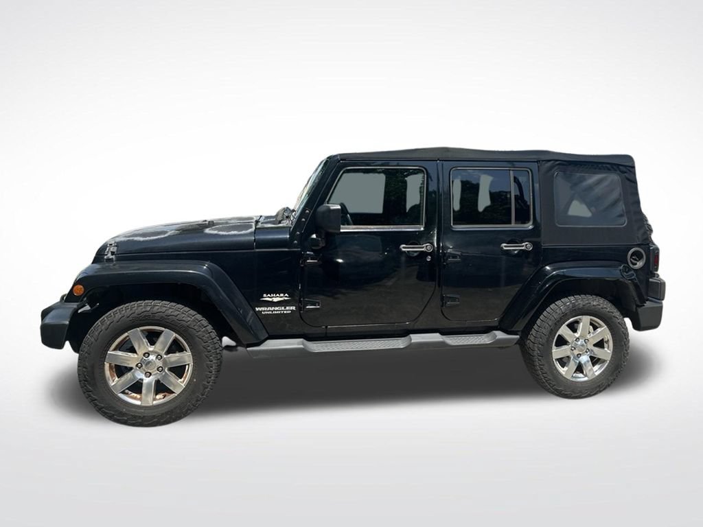 Used 2013 Jeep Wrangler Unlimited Sahara w/ Connectivity Group AWD/4WD image 2