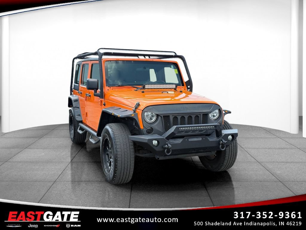 Used 2012 Jeep Wrangler Unlimited Sport w/ Connectivity Group AWD/4WD image 1
