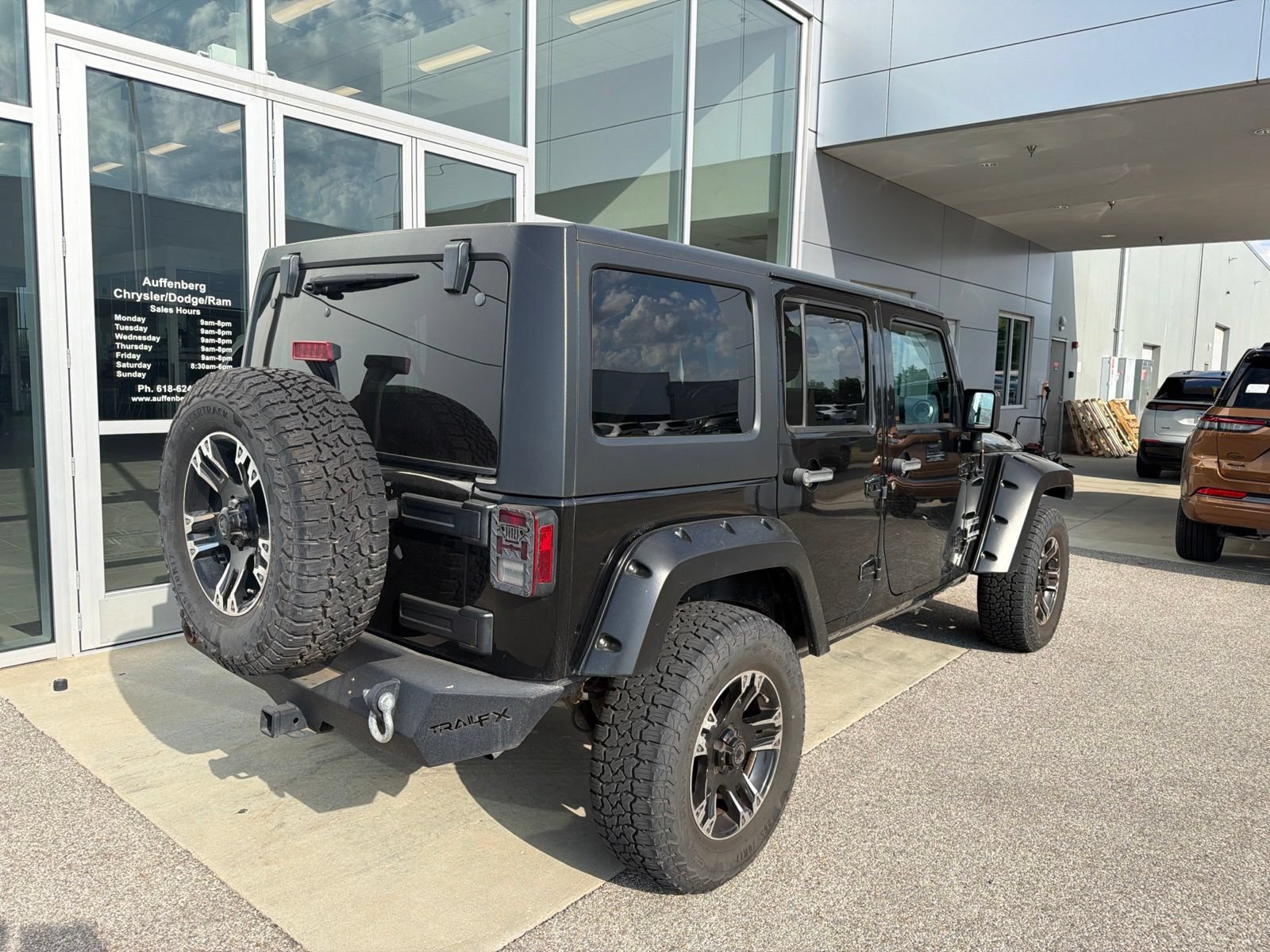 Used 2012 Jeep Wrangler Unlimited Sport AWD/4WD image 2