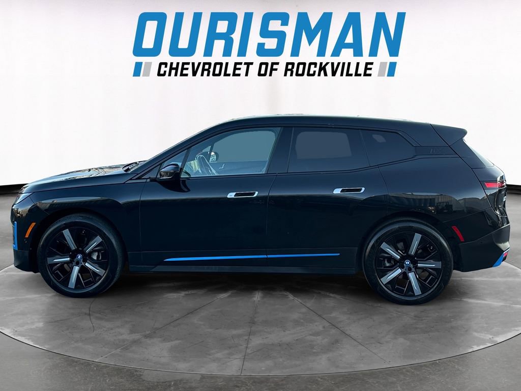 Used 2023 BMW iX xDrive50 w/ BMW I Signature Blue Package AWD/4WD image 3