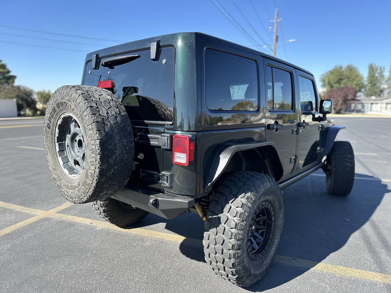Used 2012 Jeep Wrangler Unlimited Rubicon w/ Dual Top Group image 7