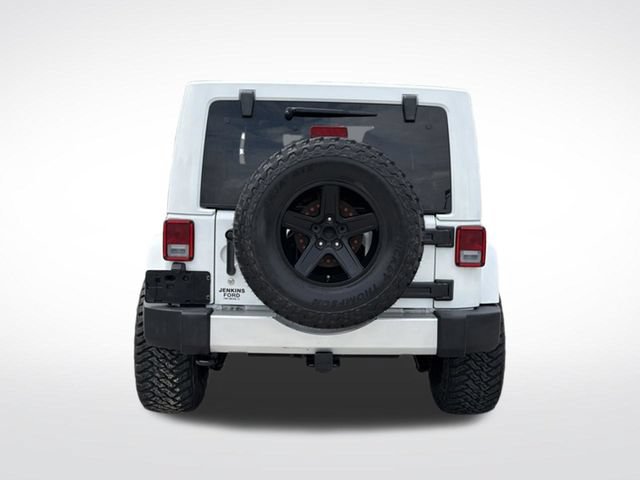 Used 2015 Jeep Wrangler Unlimited Sahara w/ Dual Top Group AWD/4WD video 4