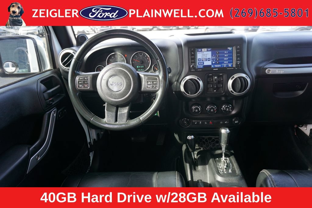 Used 2012 Jeep Wrangler Unlimited Sahara w/ Dual Top Group AWD/4WD image 12