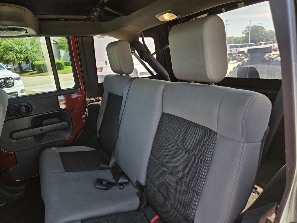 Used 2010 Jeep Wrangler Unlimited Sahara w/ Dual Top Group AWD/4WD image 25