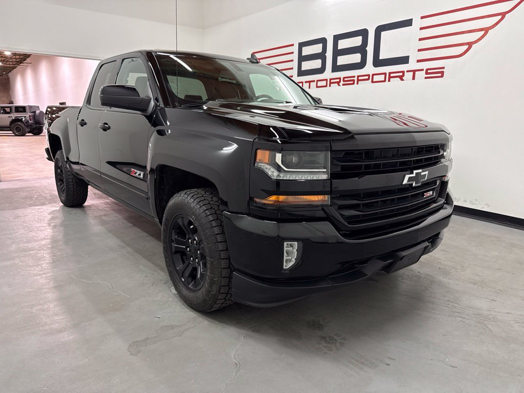 Used 2017 Chevrolet Silverado 1500 LT w/ Midnight Edition AWD/4WD image 1
