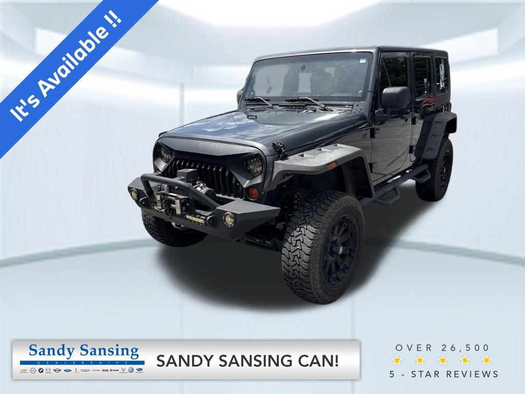 Used 2010 Jeep Wrangler Unlimited Sport AWD/4WD image 1