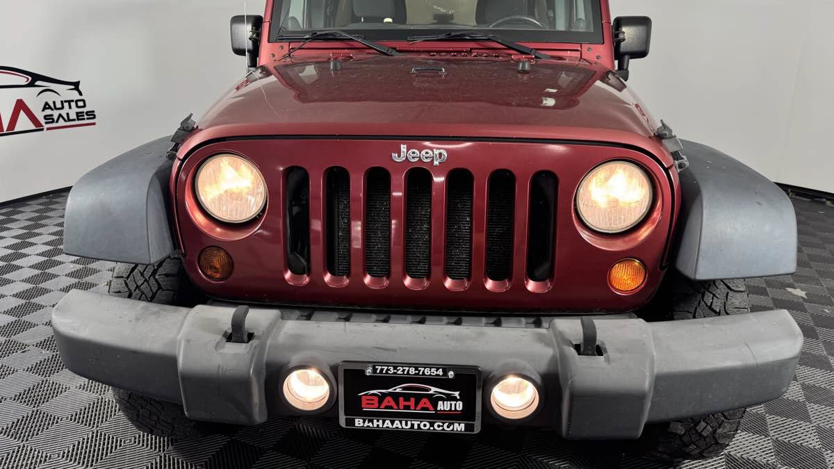 Used 2012 Jeep Wrangler Unlimited Sport AWD/4WD image 9