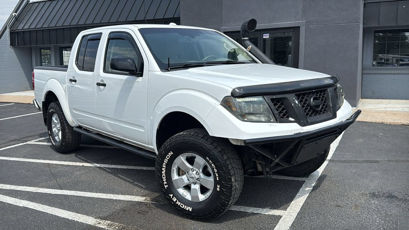 Used 2012 Nissan Frontier SV w/ SV Premium Utility Pkg AWD/4WD image 1