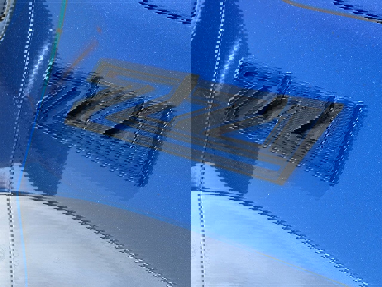 Certified 2024 Chevrolet Silverado 1500 Custom Trail Boss w/ LPO, Dark Essentials Package image 3