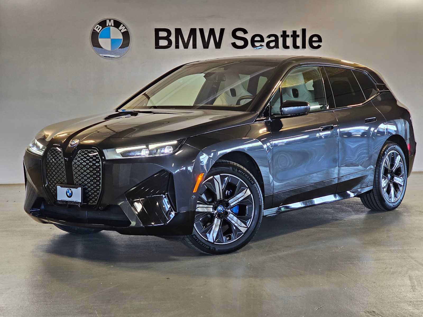 Used 2024 BMW iX xDrive50 w/ Sport Package AWD/4WD image 1