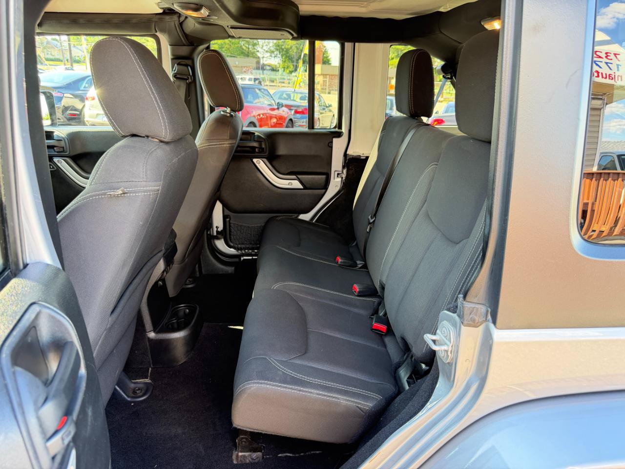 Used 2015 Jeep Wrangler Unlimited Sahara w/ Dual Top Group AWD/4WD image 28