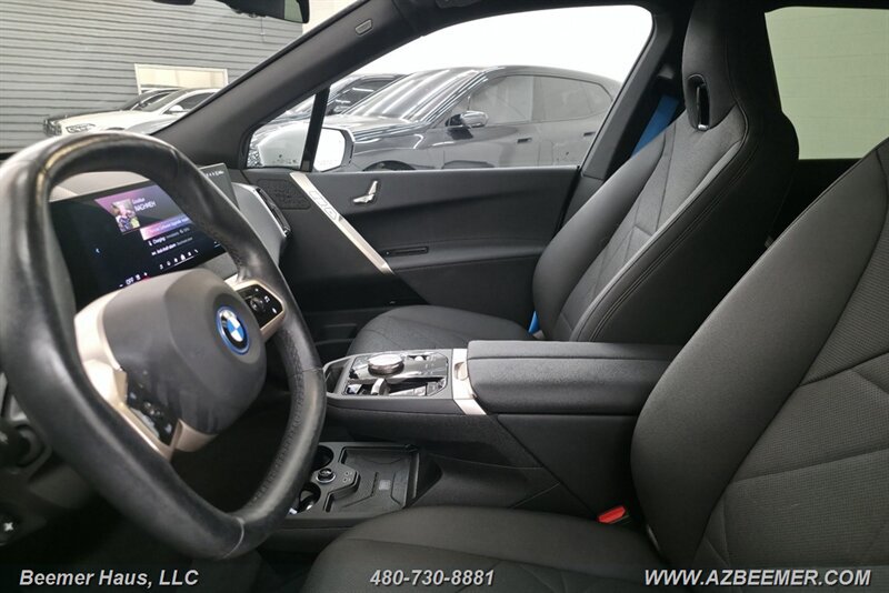 Used 2024 BMW iX xDrive50 w/ BMW I Signature Blue Package AWD/4WD image 26