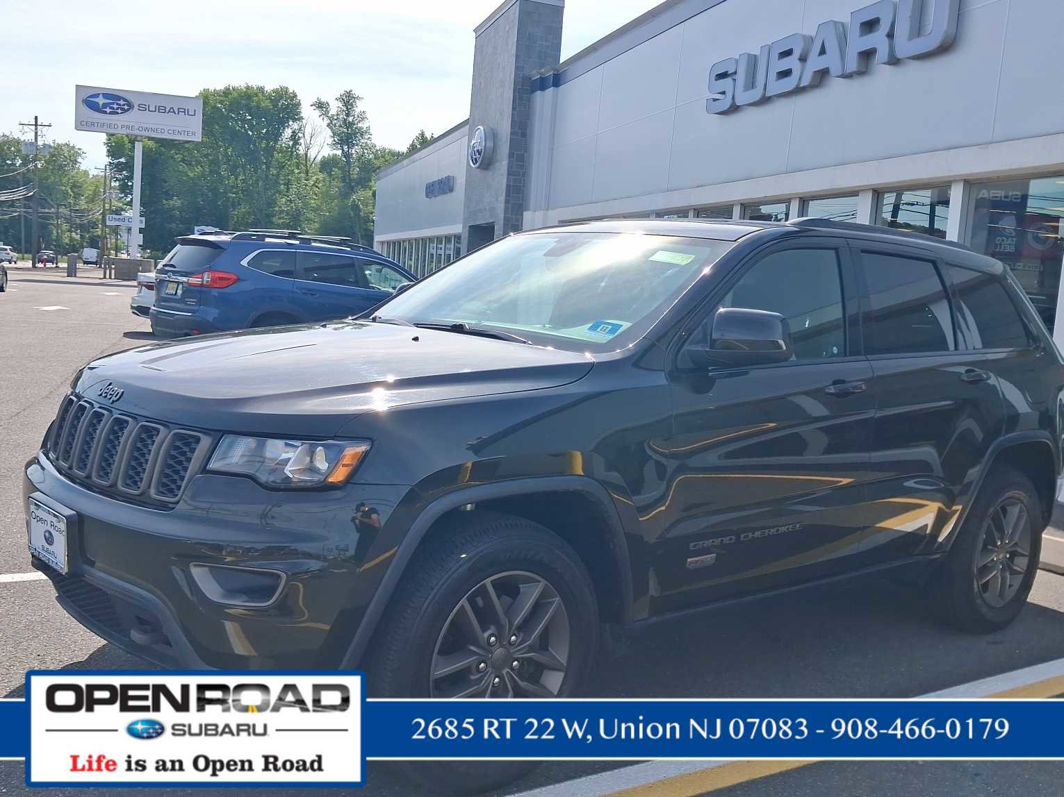 Used 2016 Jeep Grand Cherokee Laredo 75th Anniversary AWD/4WD image 4