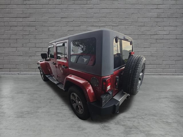Used 2012 Jeep Wrangler Unlimited Sahara w/ Dual Top Group AWD/4WD image 7