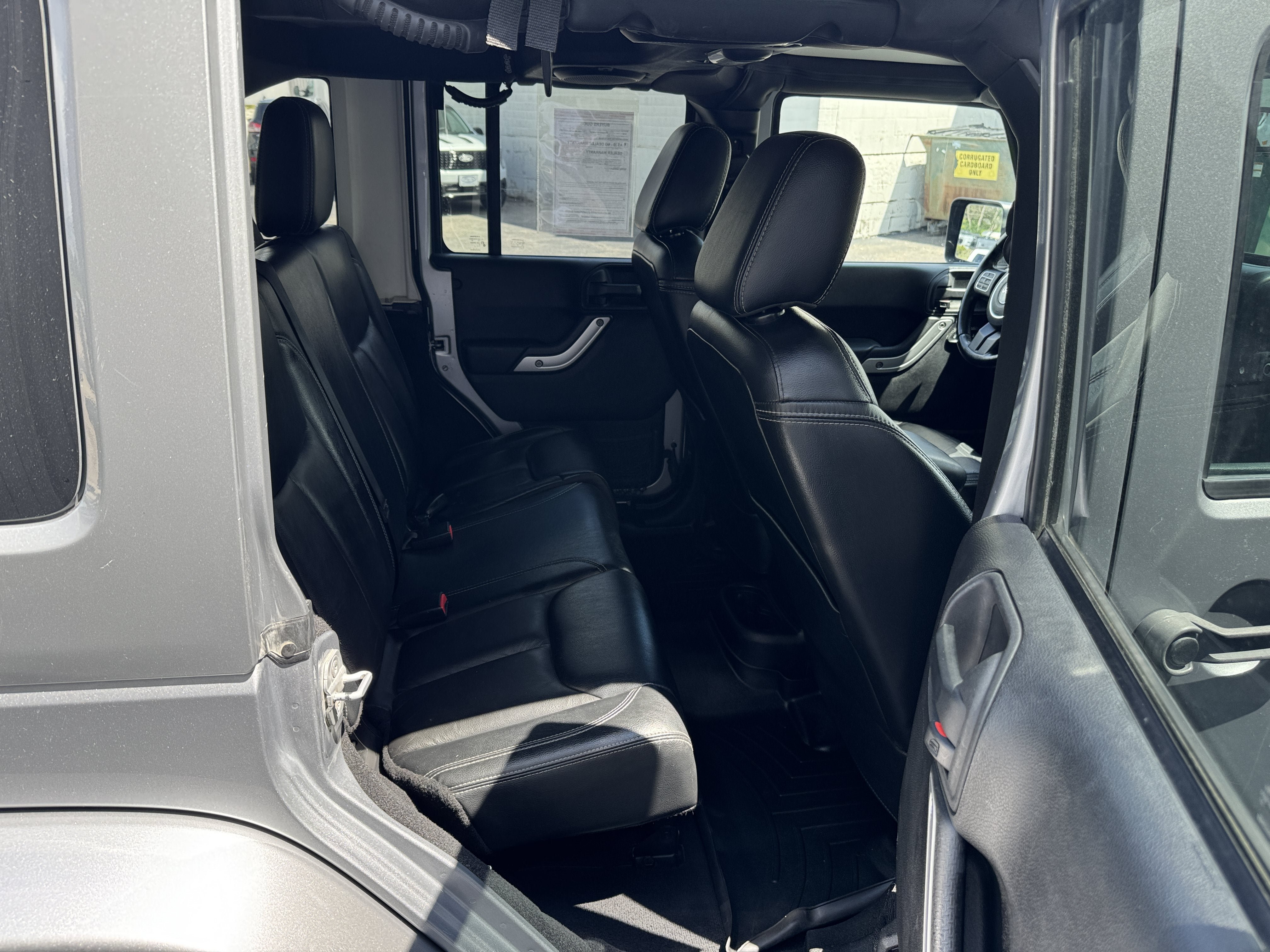 Used 2013 Jeep Wrangler Unlimited Sahara w/ Dual Top Group AWD/4WD image 26