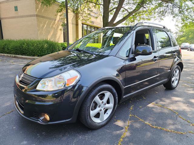 Used 2009 Suzuki SX4 AWD Hatchback w/ Touring Pkg
