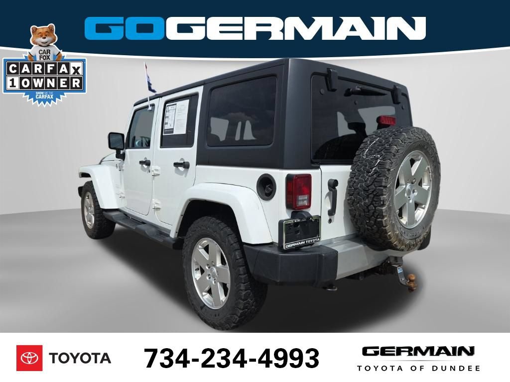 Used 2012 Jeep Wrangler Unlimited Sahara w/ Dual Top Group AWD/4WD image 10