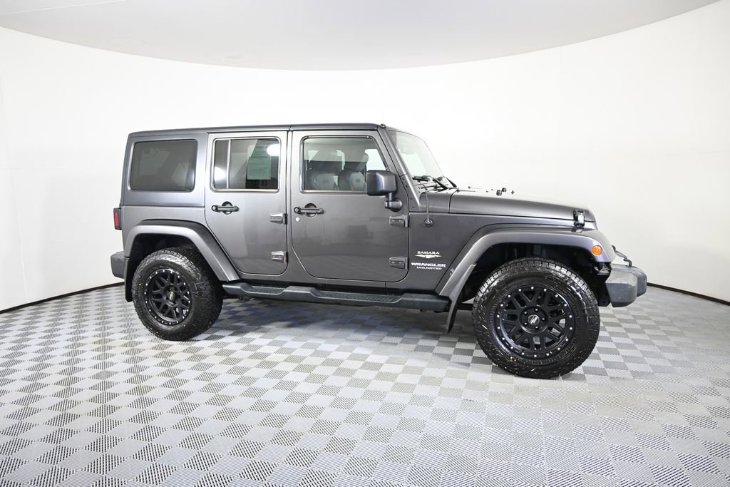 Used 2014 Jeep Wrangler Unlimited Sahara w/ Connectivity Group AWD/4WD image 8