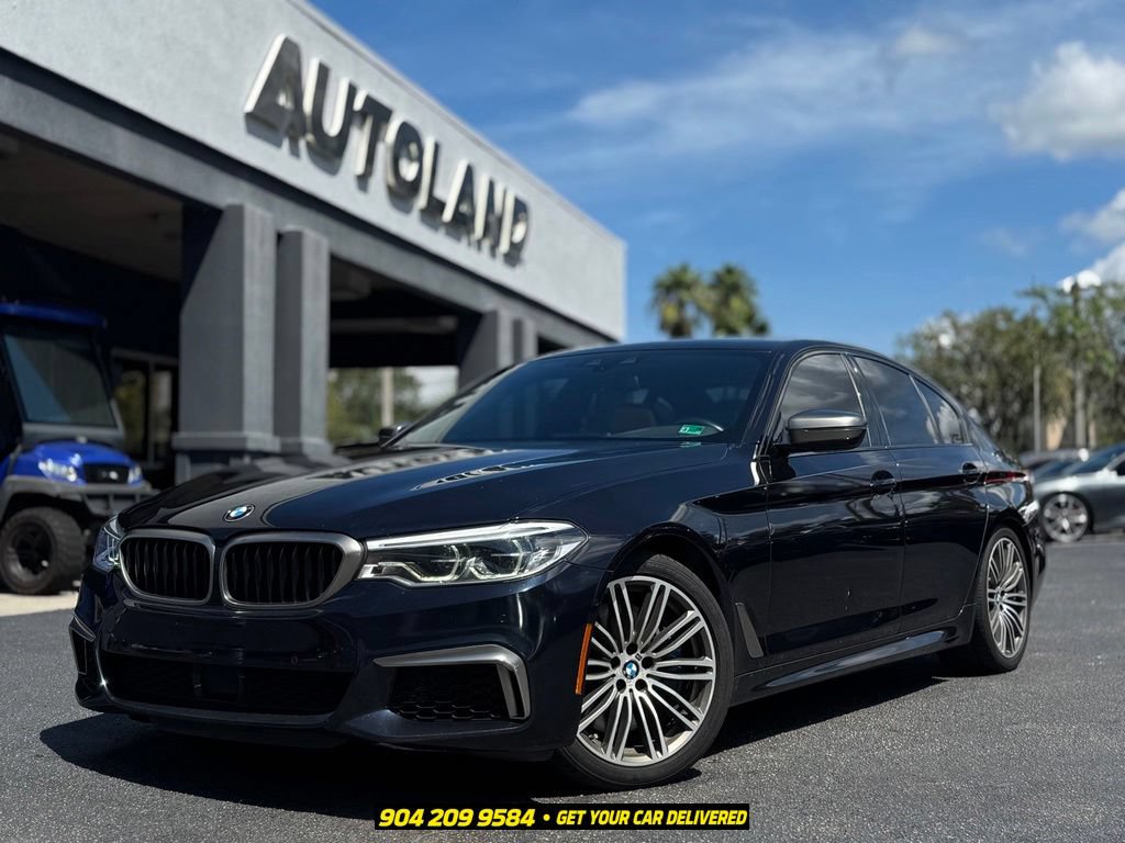 Used 2020 BMW M550i xDrive AWD/4WD image 1