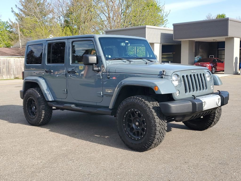 Used 2014 Jeep Wrangler Unlimited Sahara w/ Connectivity Group AWD/4WD video 2